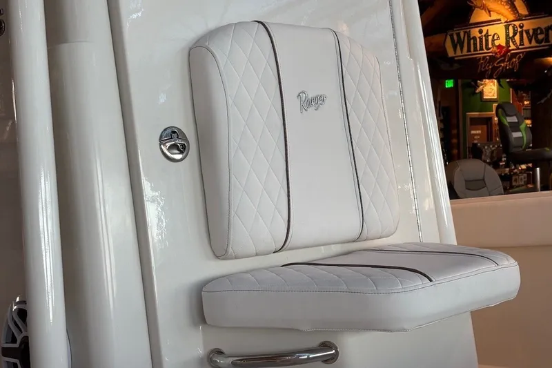 Slide: The Image of 2026 Ranger 2510 Bay boat seat with white quilted upholstery and logo detail. - 14
