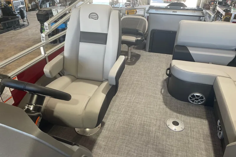 Slide: The Image of 2026 Sun Tracker SportFish 22 XP3 interior with plush seating and modern design. - 11