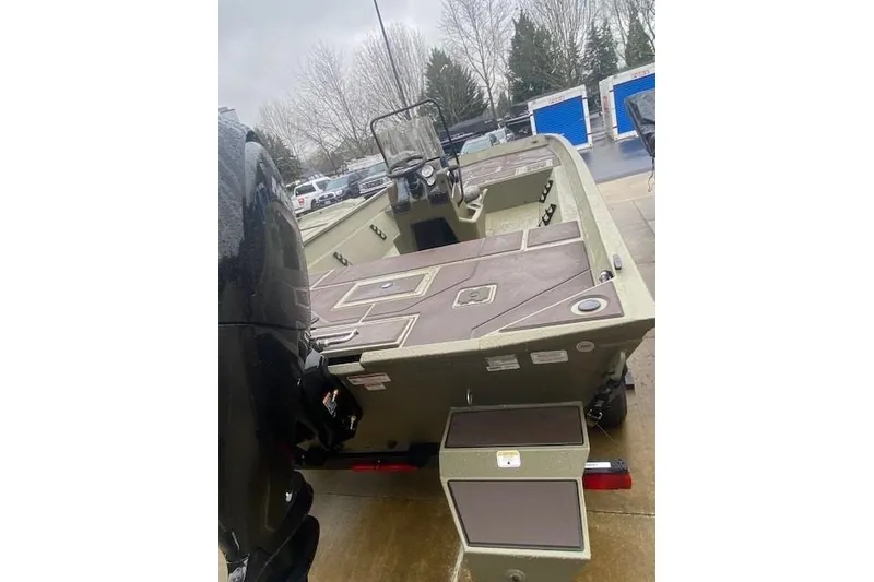 Slide: The Image of 2026 Tracker Grizzly 2072 CC boat with spacious deck and modern design. - 38