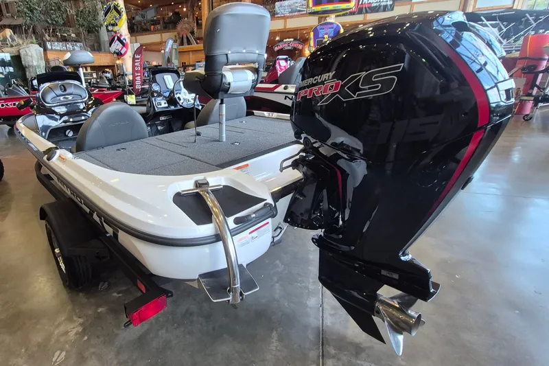 Slide: The Image of 2026 Nitro Z17 boat with Mercury Pro XS engine displayed indoors. - 3
