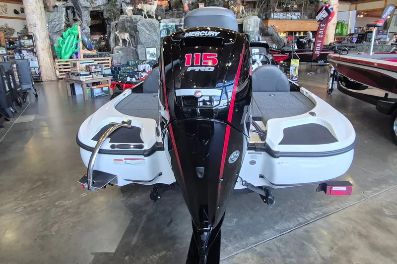 Slide: The Image of 2026 Nitro Z17 boat with Mercury 115 Pro XS engine displayed indoors. - 2