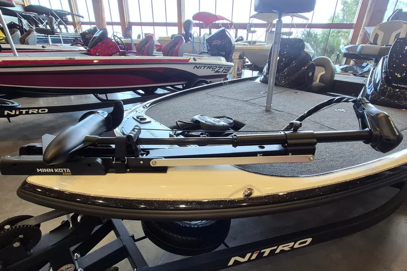 Slide: The Image of 2026 Nitro Z17 boat with Minn Kota trolling motor in showroom. - 6