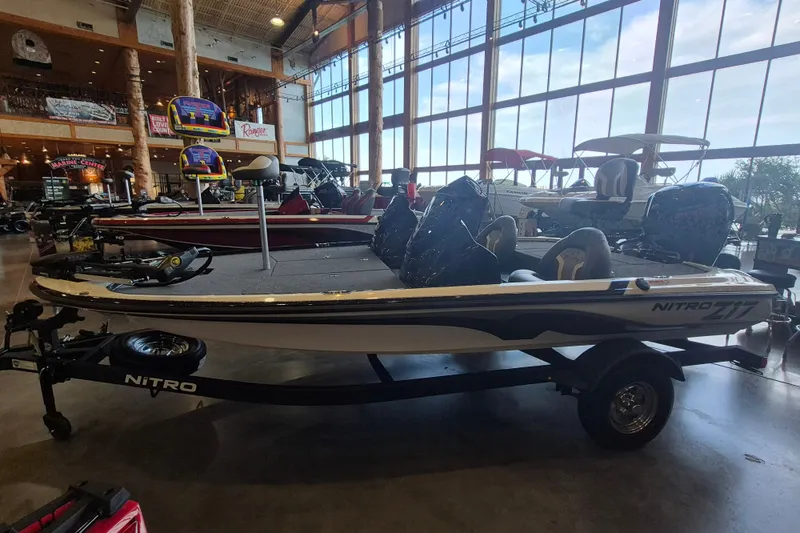 Slide: The Image of 2026 Nitro Z17 boat displayed indoors, showcasing sleek design and modern features. - 4