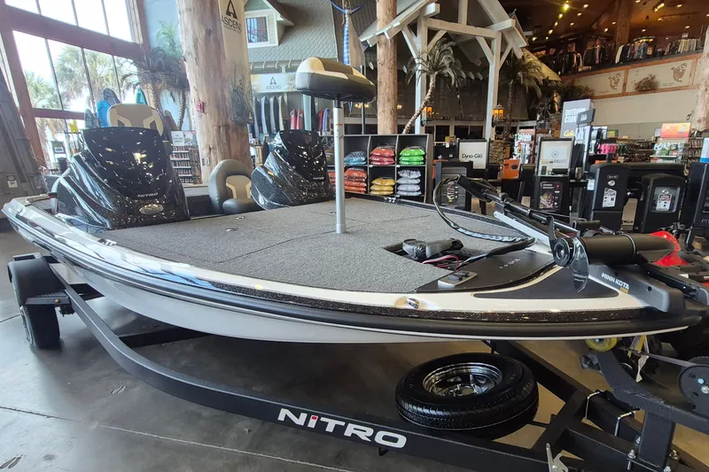 Slide: The Image of 2026 Nitro Z17 boat displayed indoors, featuring sleek design and modern equipment. - 8