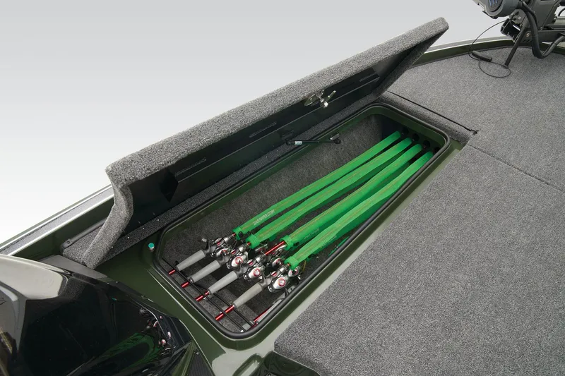 Slide: The Image of 2026 Triton 20XP Patriot boat storage compartment with cup holders and drainage. - 30