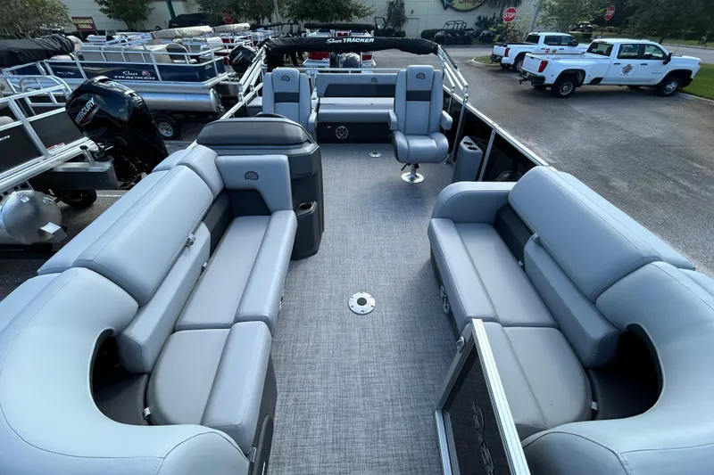 Slide: The Image of 2026 Sun Tracker Party Barge 22 RF DLX with spacious seating and modern design. - 2