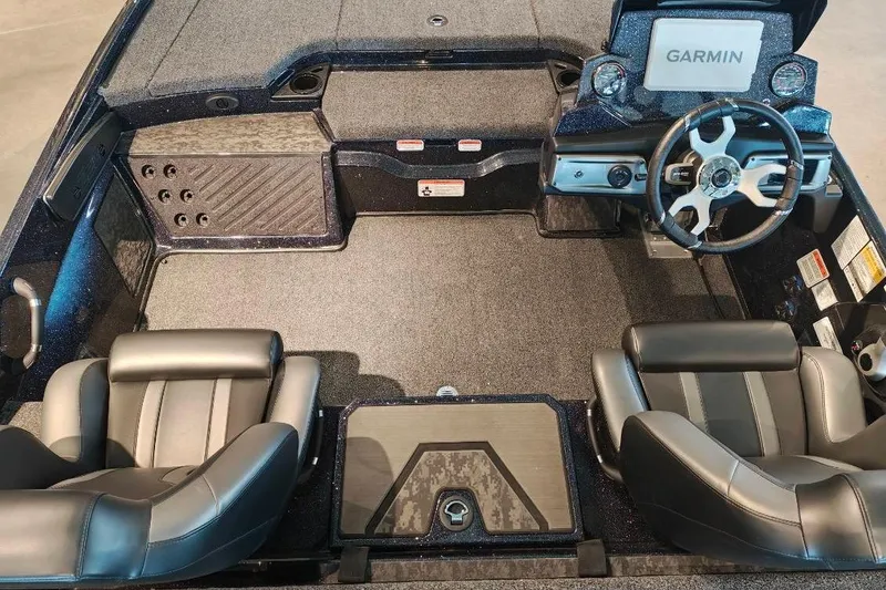 Slide: The Image of 2026 Nitro Z20 XL Pro boat interior with Garmin navigation, dual seats, and sleek dashboard design. - 7