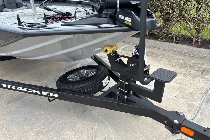 Slide: The Image of 2026 Tracker Pro Team 195 boat on trailer with Minn Kota Maxxum motor. - 31