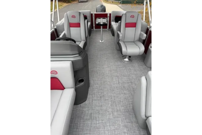 Slide: The Image of 2026 Sun Tracker Party Barge 22 DLX interior with gray and red seating. - 9