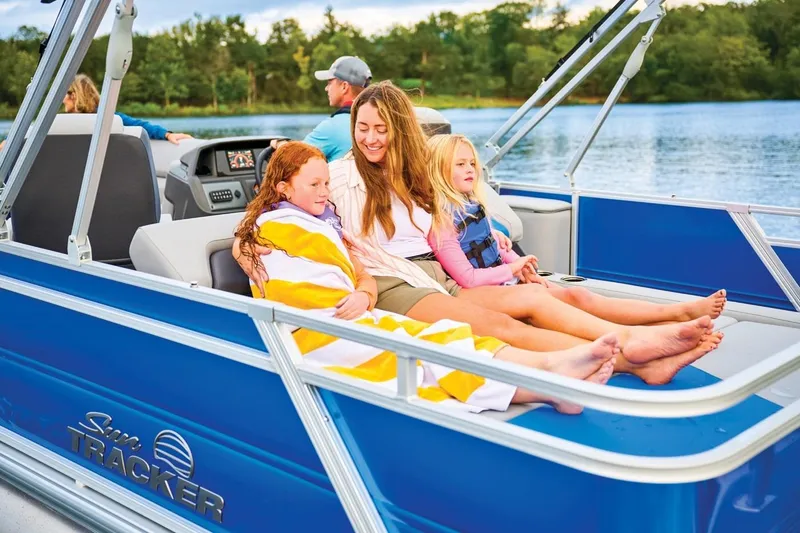 Slide: The Image of Family enjoying a ride on 2026 Sun Tracker Party Barge 22 RF XP3 pontoon boat. - 13