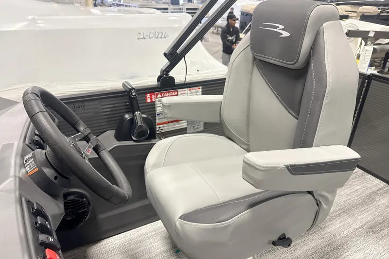 Slide: The Image of Captain's seat and steering of 2026 Bennington 20 S Cruise pontoon boat. - 6