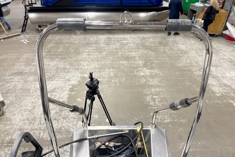 Slide: The Image of 2026 Bennington 20 S Cruise pontoon boat in a workshop setting. - 7