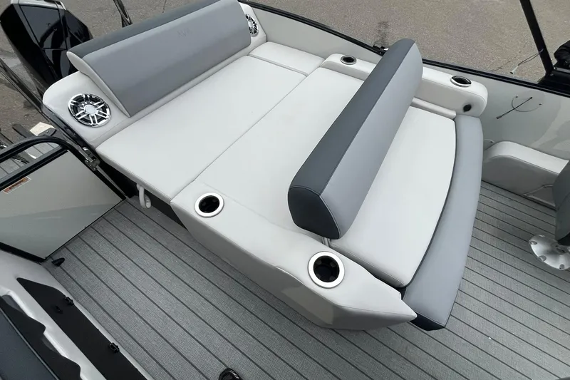 Slide: The Image of 2026 Avalon Catalina Versatile Rear Lounger with gray seating and cup holders. - 13