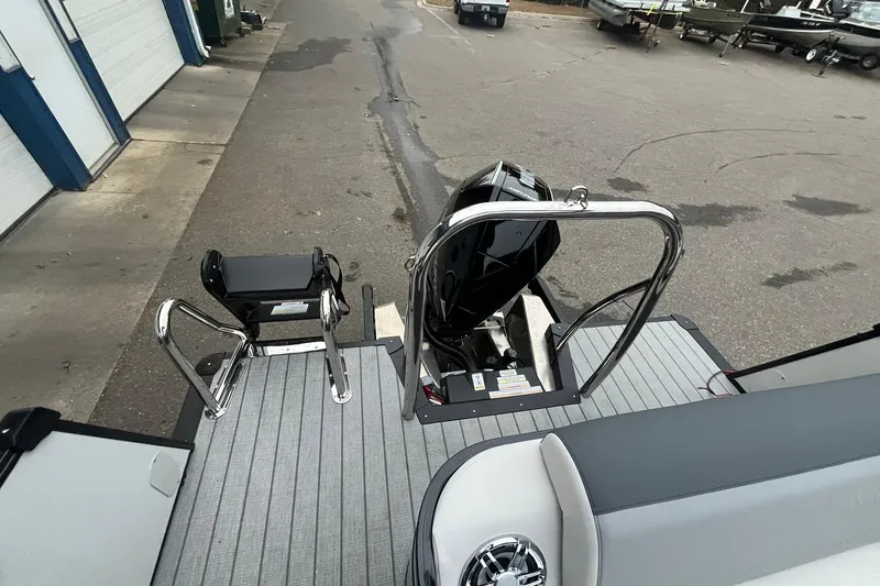 Slide: The Image of 2026 Avalon Catalina Versatile Rear Lounger boat with motor and swim platform. - 14