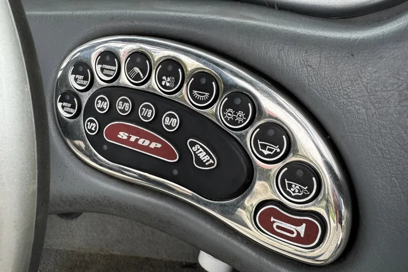 Slide: The Image of Control panel of a 2004 Nautique Air Nautique 216 boat dashboard. - 6