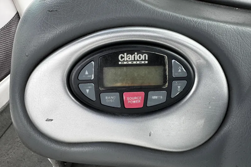 Slide: The Image of Clarion Marine audio control panel in 2004 Nautique Air Nautique 216 boat. - 7