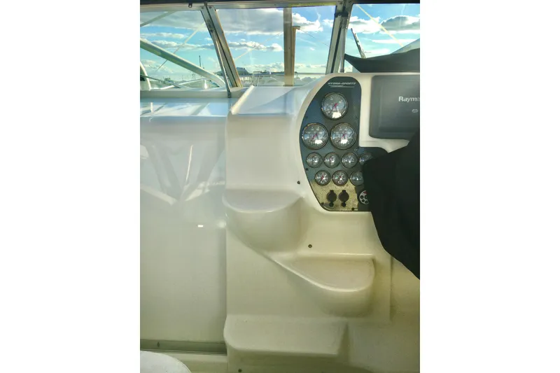 Slide: The Image of 2006 Hydra-Sports Vector 2900 VX dashboard with gauges and navigation equipment. - 22