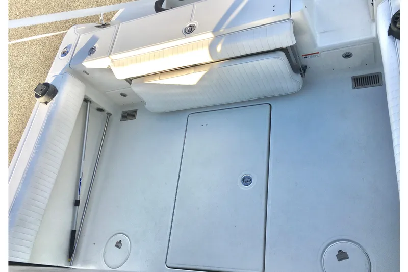 Slide: The Image of 2006 Hydra-Sports Vector 2900 VX boat deck with seating and storage compartments. - 25