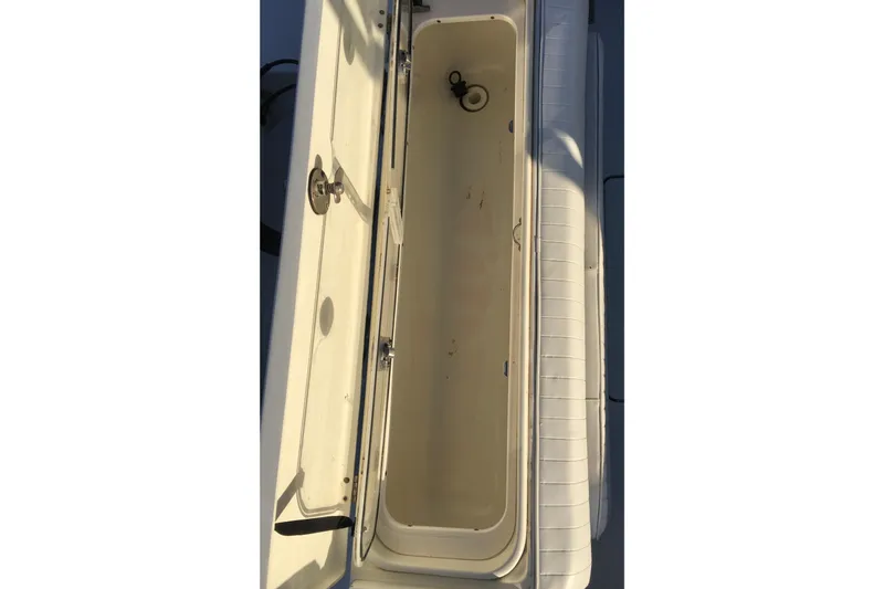 Slide: The Image of Open storage compartment on 2006 Hydra-Sports Vector 2900 VX boat. - 26
