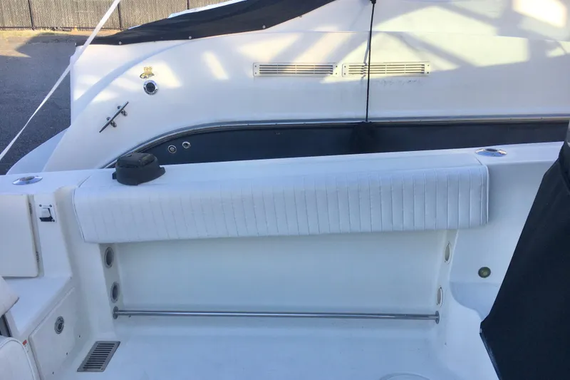 Slide: The Image of 2006 Hydra-Sports Vector 2900 VX boat interior with white seating and deck details. - 28