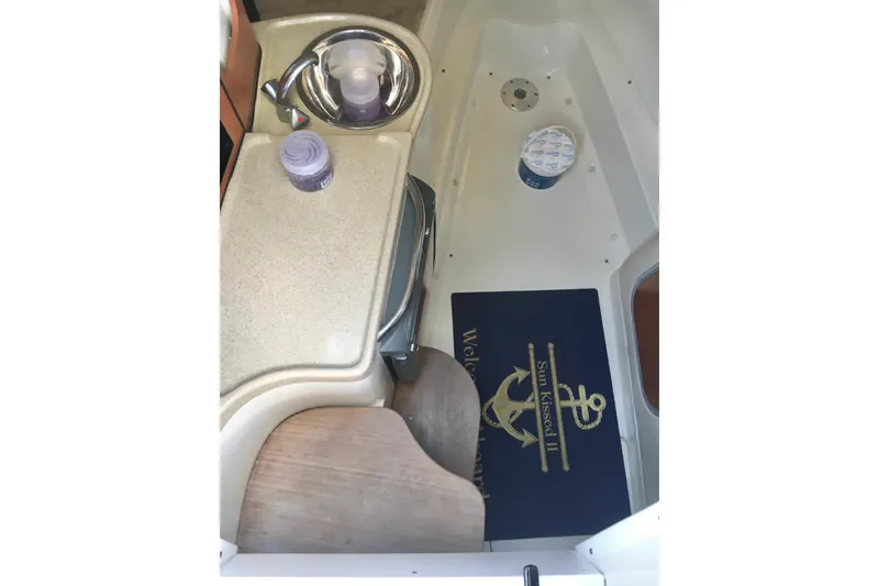 Slide: The Image of 2006 Hydra-Sports Vector 2900 VX cabin interior with sink and welcome mat. - 29