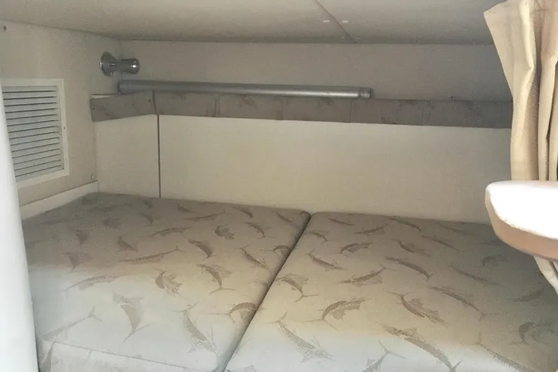 Slide: The Image of 2006 Hydra-Sports Vector 2900 VX cabin interior with patterned bedding. - 35