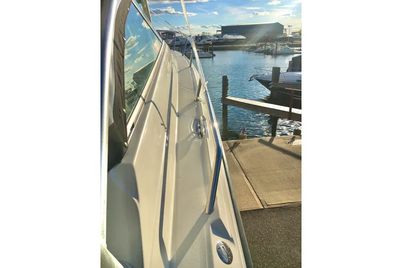 Slide: The Image of 2006 Hydra-Sports Vector 2900 VX docked at a marina under a sunny sky. - 39