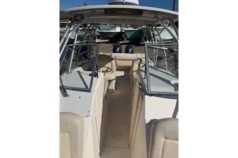 Slide: The Image of 2011 Grady-White Freedom 275 boat interior with open deck and seating. - 18