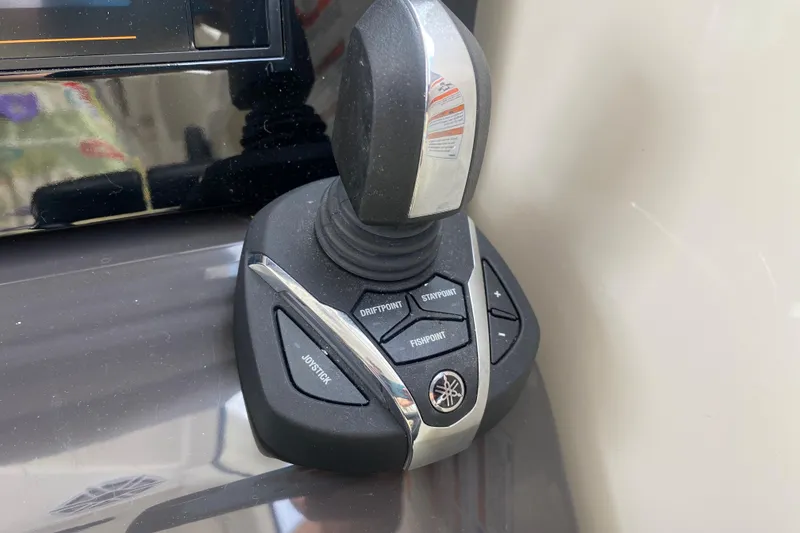 Slide: The Image of Joystick control panel on 2021 Pursuit OS 355 Offshore boat. - 20