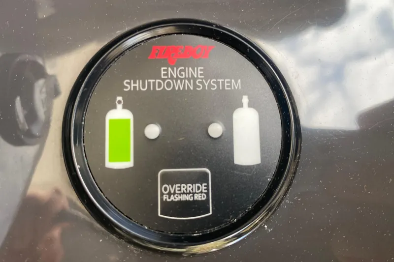 Slide: The Image of Fireboy engine shutdown system on 2021 Pursuit OS 355 Offshore boat. - 48