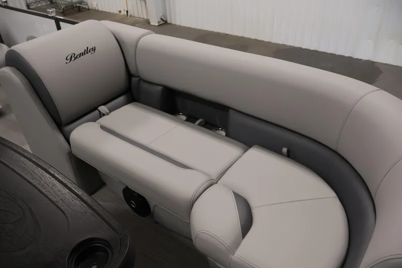 Slide: The Image of 2026 Bentley Pontoons 220 SWINGBACK interior seating, featuring luxurious gray upholstery. - 11