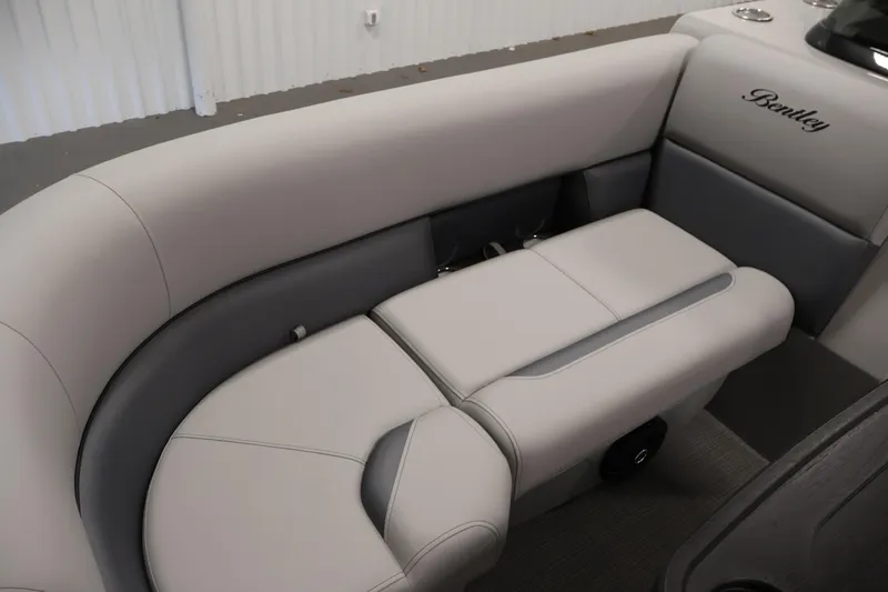 Slide: The Image of 2026 Bentley Pontoons 220 SWINGBACK interior seating, featuring luxurious gray upholstery. - 14