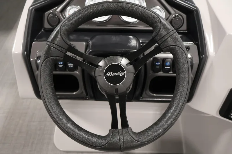 Slide: The Image of Steering wheel of 2026 Bentley Pontoons 220 SWINGBACK, featuring sleek design and controls. - 19