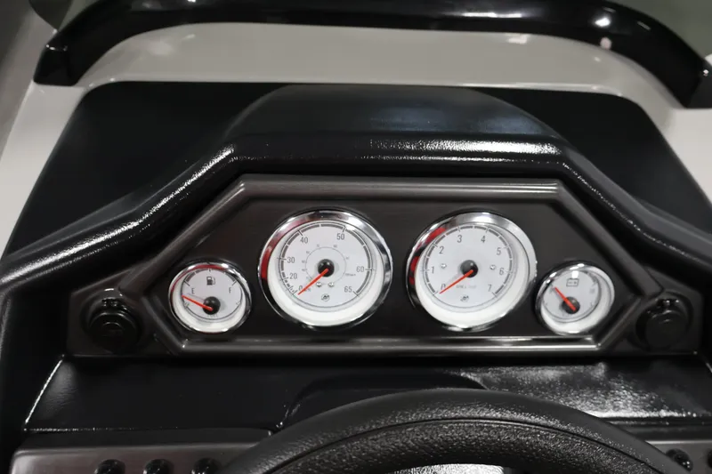 Slide: The Image of Dashboard of 2026 Bentley Pontoons 220 SWINGBACK with analog gauges and sleek design. - 20