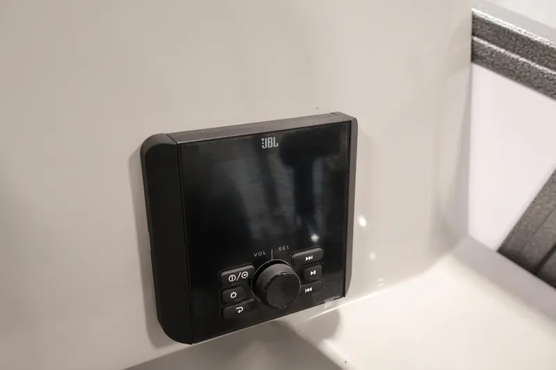 Slide: The Image of JBL audio control panel on 2026 Bentley Pontoons 220 SWINGBACK. - 23