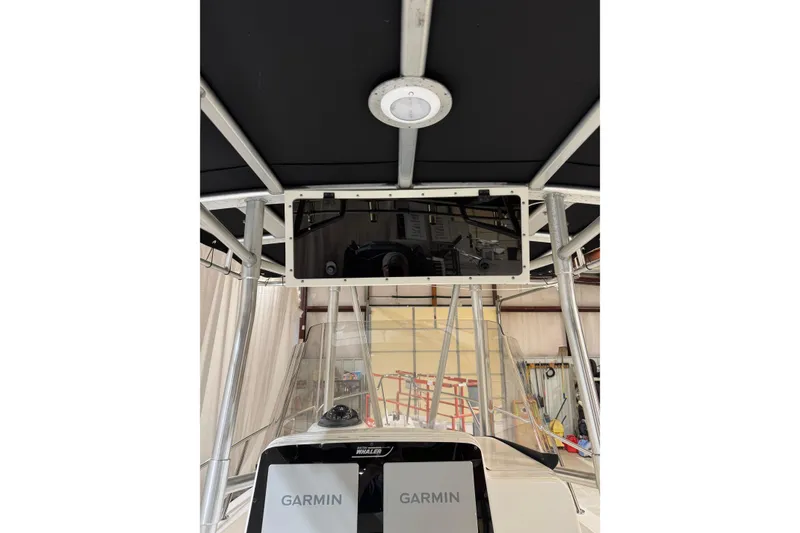 Slide: The Image of Boston Whaler 21 Outrage 2000 boat interior with Garmin navigation system. - 9