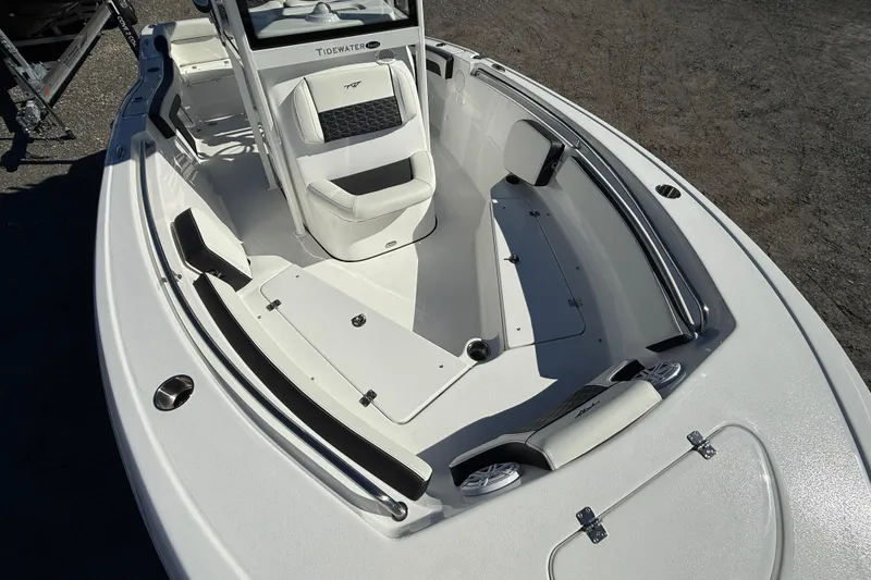 Slide: The Image of 2026 Tidewater 210 LXF boat interior with seating and storage compartments. - 15
