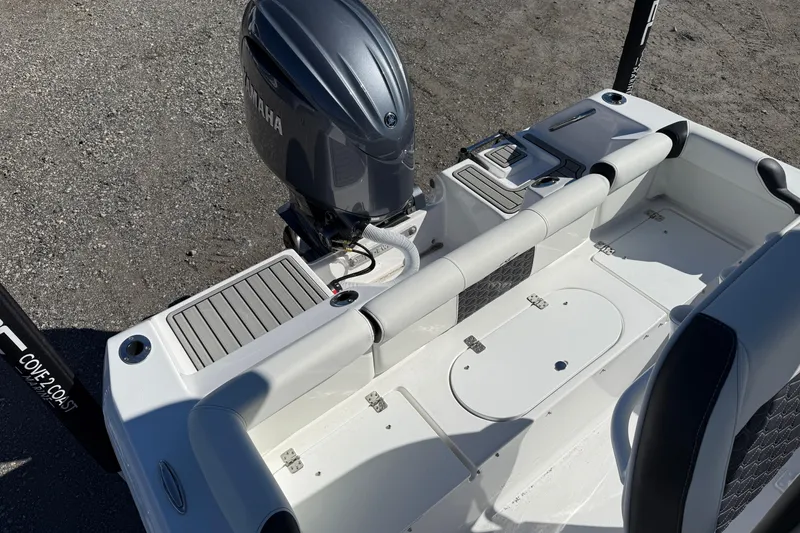 Slide: The Image of 2026 Tidewater 210 LXF boat with Yamaha engine, featuring spacious seating and storage. - 22