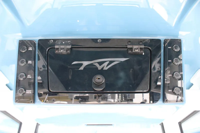 Slide: The Image of Control panel of 2026 Tidewater 210 LXF boat with switches and logo. - 25