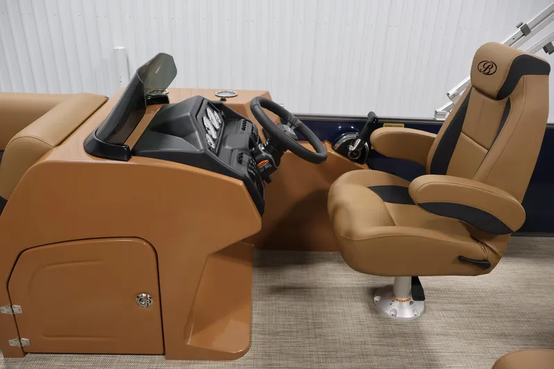 Slide: The Image of 2026 Bentley Pontoons 243 Swingback Tri-toon helm with tan and black captain's chair. - 15