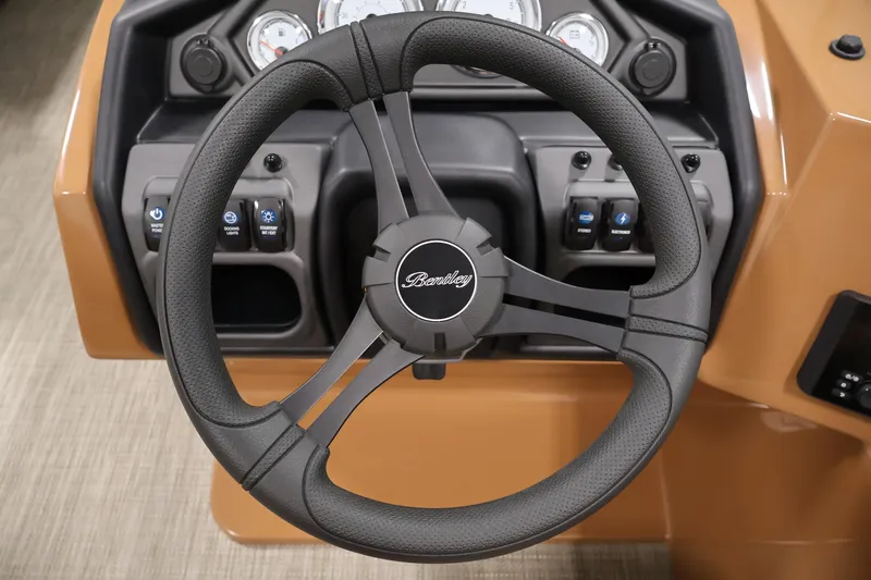 Slide: The Image of Steering wheel of 2026 Bentley Pontoons 243 Swingback Tri-toon with dashboard controls. - 18