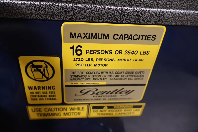 Slide: The Image of 2026 Bentley Pontoons 243 Swingback Tri-toon capacity label, 16 persons or 2540 lbs. - 23