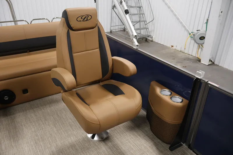 Slide: The Image of Luxurious interior of 2026 Bentley Pontoons 243 Swingback Tri-toon with tan seating. - 25