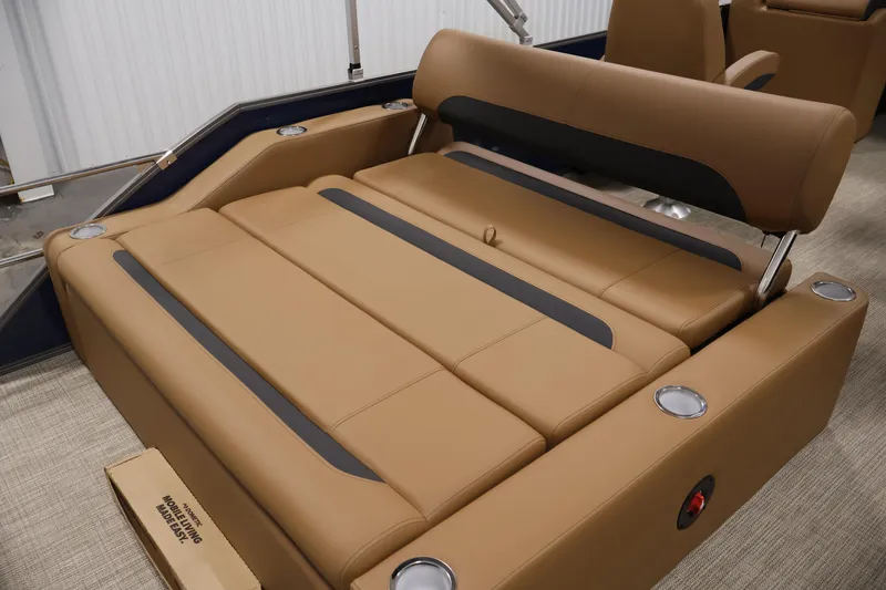 Slide: The Image of 2026 Bentley Pontoons 243 Swingback Tri-toon with luxurious tan seating and cup holders. - 27