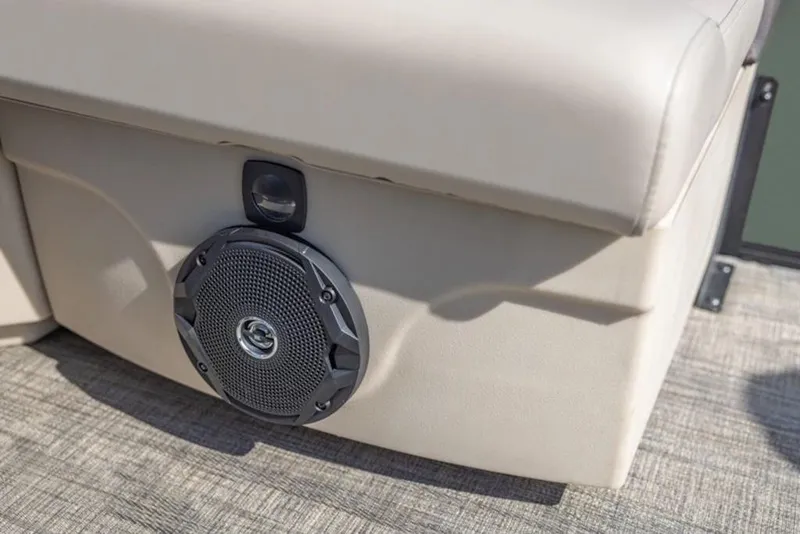 Slide: The Image of 2026 Bentley Pontoons 243 Swingback Tri-toon, rear view in a showroom setting. - 5