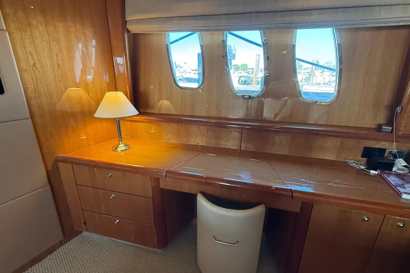 Slide: The Image of Luxurious interior of 2005 Sunseeker 75 Sport Yacht with wooden desk and lamp. - 21