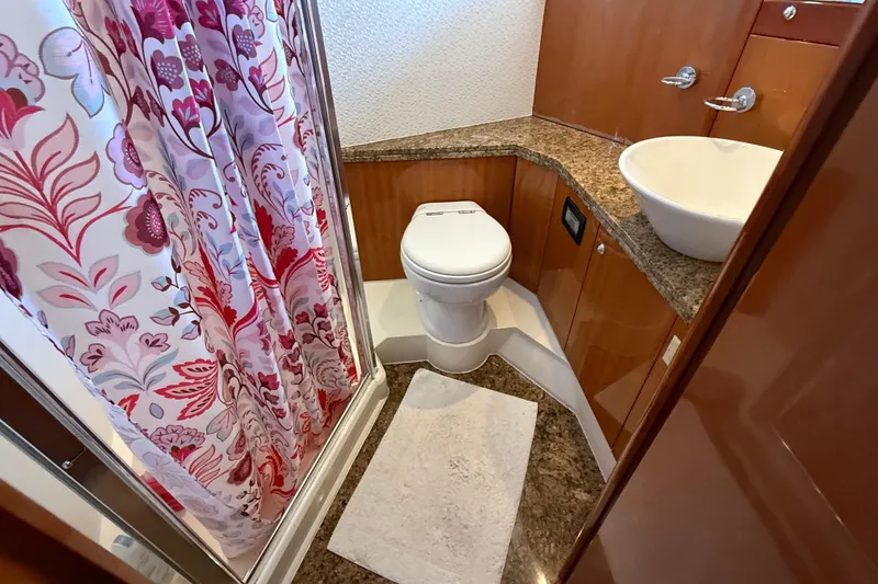 Slide: The Image of Luxurious bathroom in 2005 Sunseeker 75 Sport Yacht with floral shower curtain. - 38