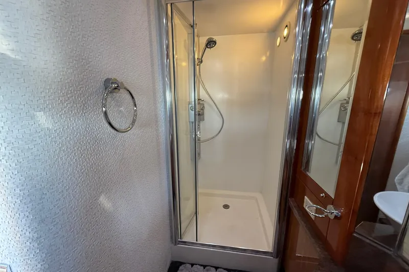 Slide: The Image of Bathroom shower in 2005 Sunseeker 75 Sport Yacht, featuring modern fixtures and elegant design. - 44