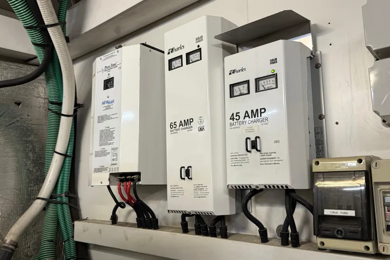 Slide: The Image of Battery chargers and electrical panel on a 2005 Sunseeker 75 Sport Yacht. - 51