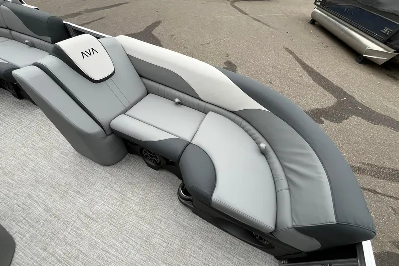 Slide: The Image of 2025 Avalon LSZ Rear Fish boat seating with gray and white upholstery. - 10